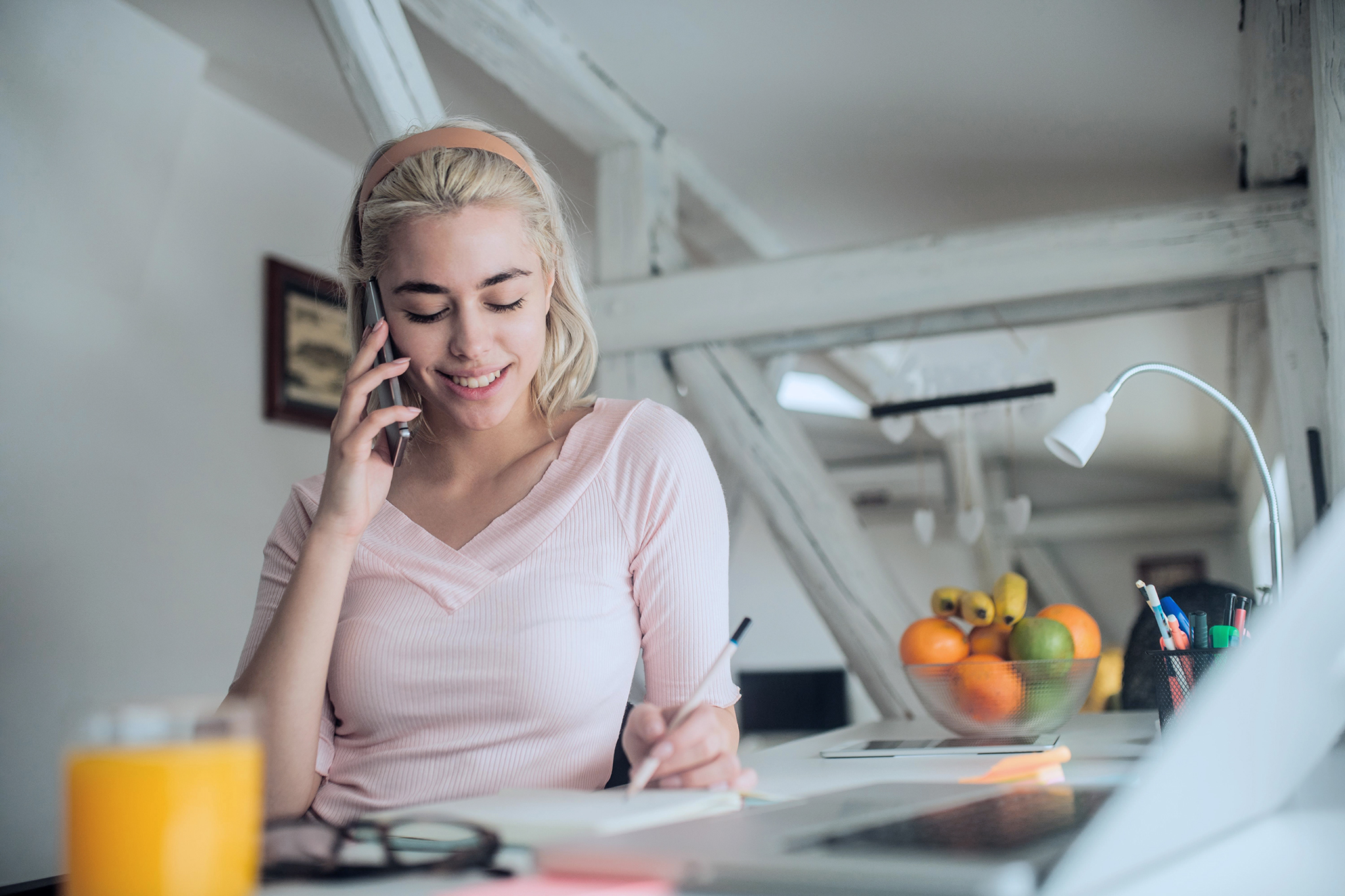 canva-young-woman-talking-phone