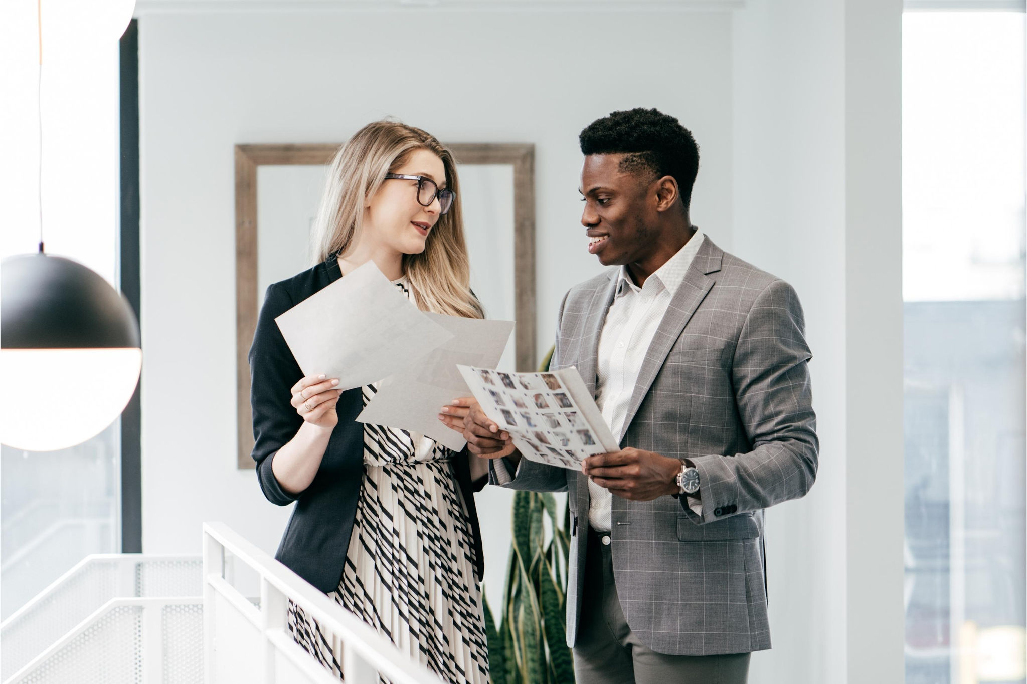 canva-diverse-male-female-workmates-discuss