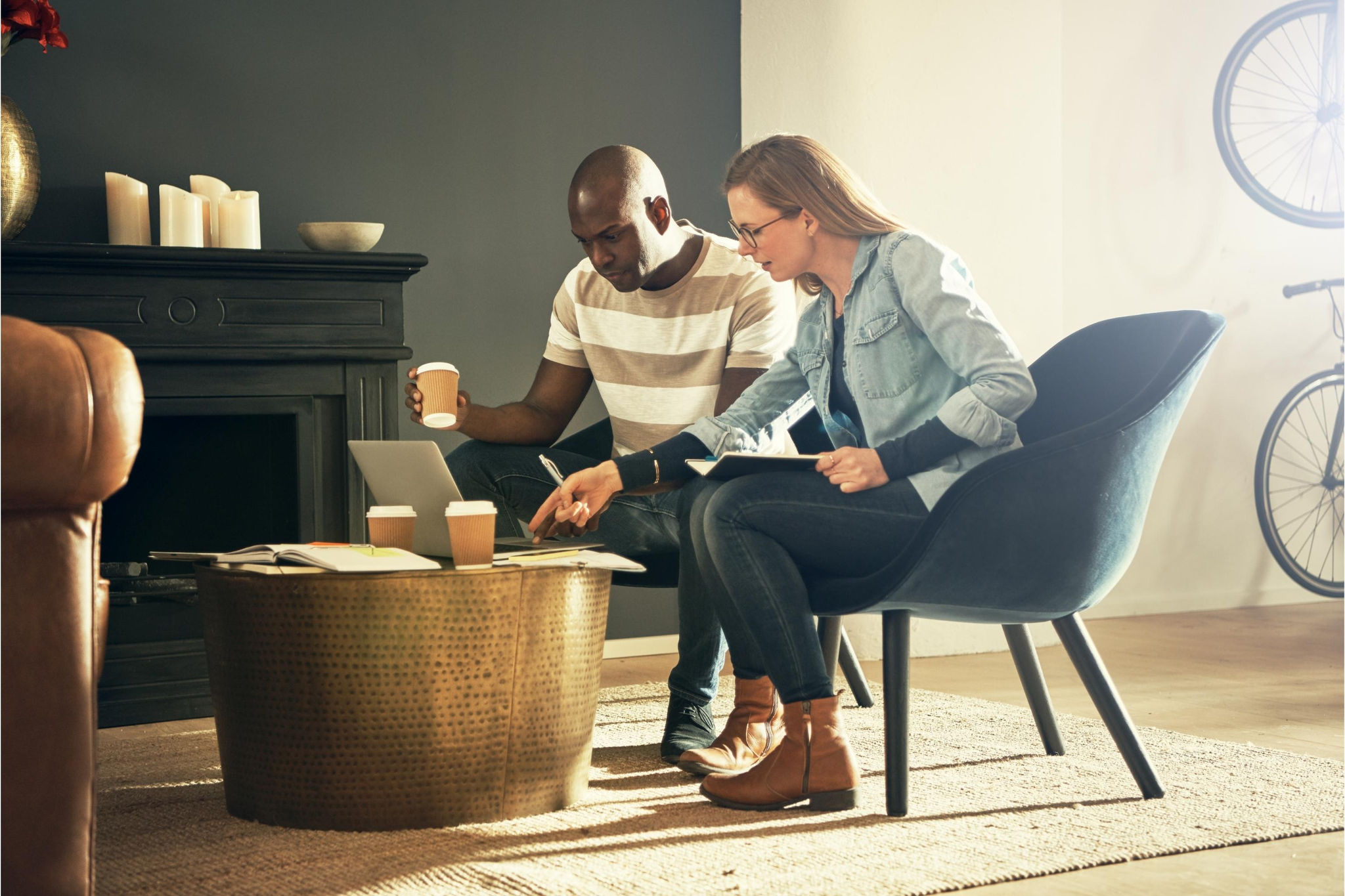 canva-colleagues-talking-laptop-co-working