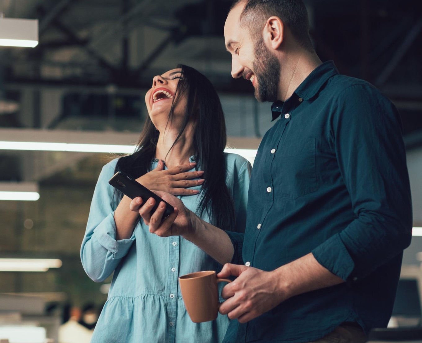 Canva-colleagues-laughing-break-talking