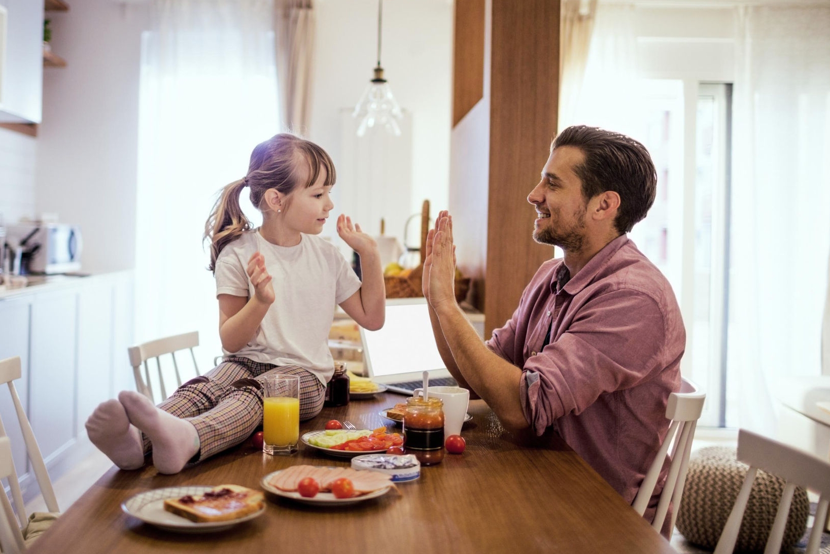 canva-father-daughter-kitchen-playing