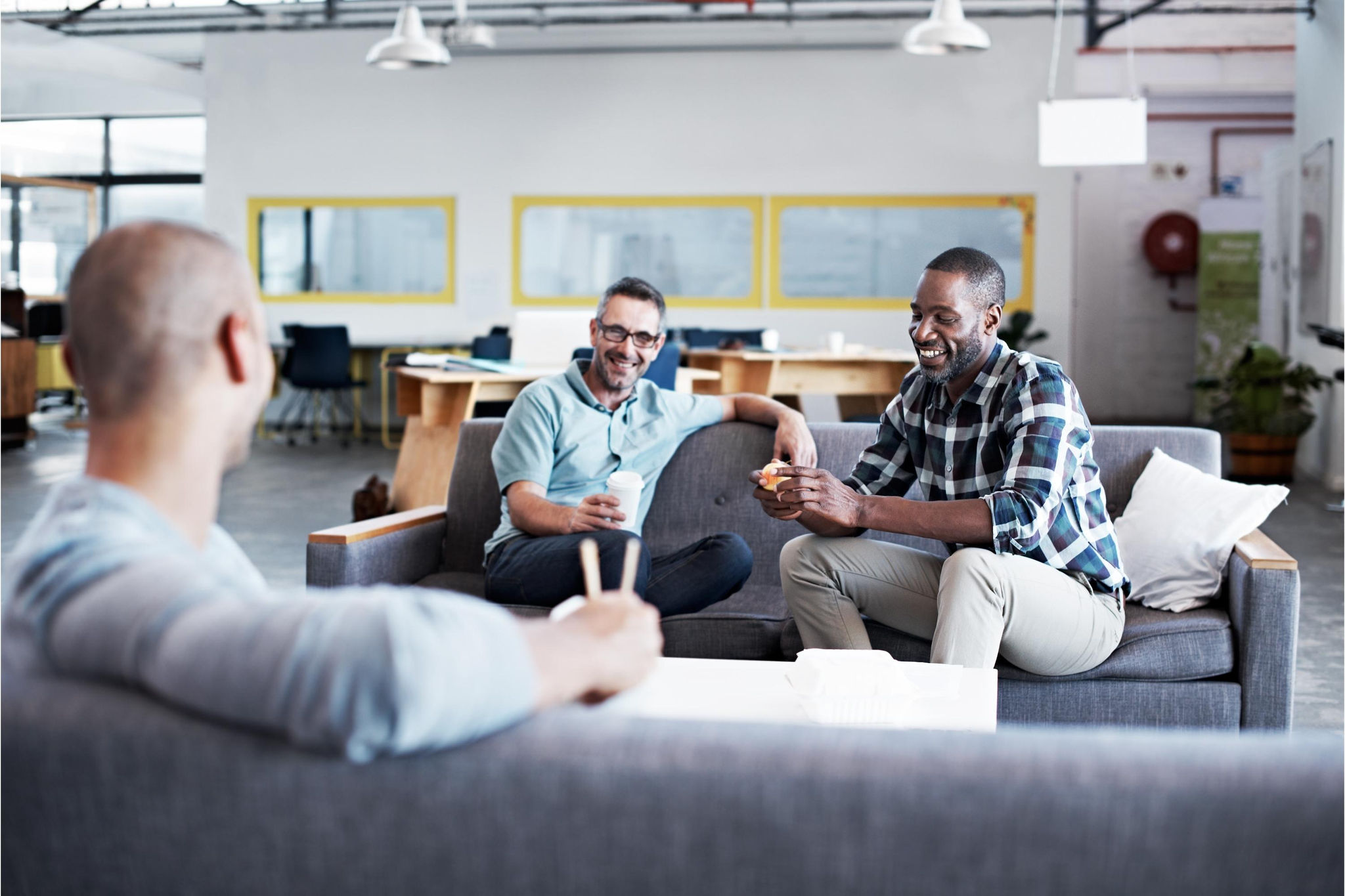 canva-male-colleagues-break-time-talking