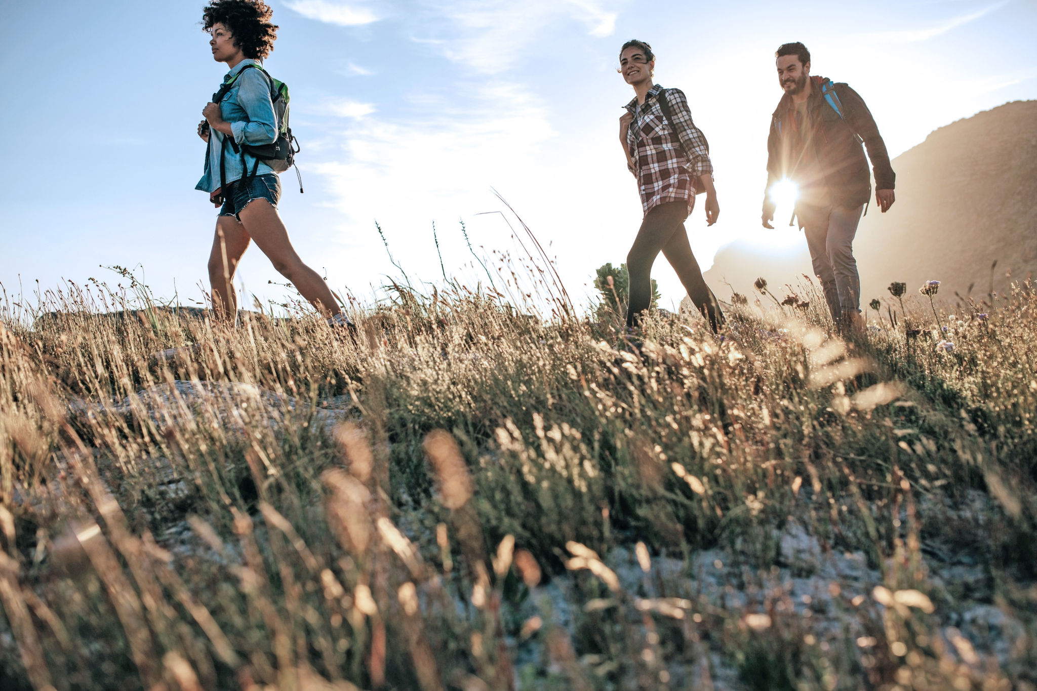 Canva-young-friends-hiking