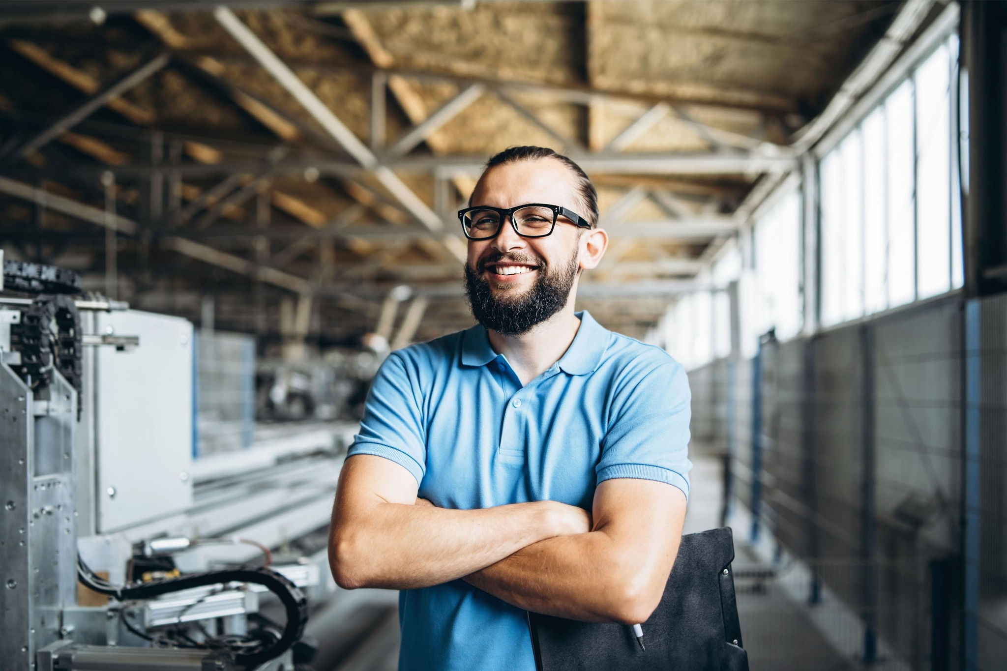 canva-young-man-inspecting-machine-factory